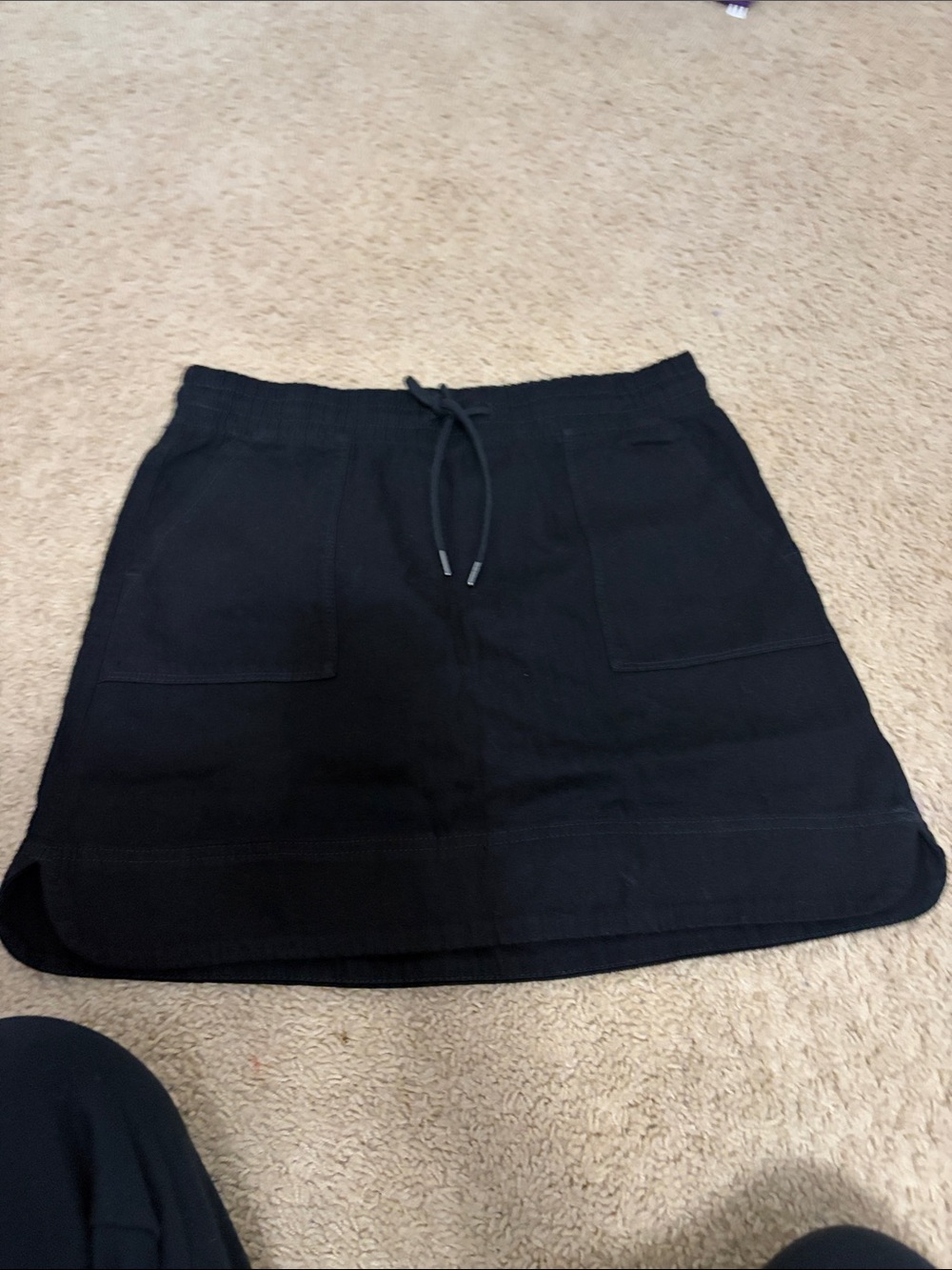 Black Mini Skirt with Drawstring Waist and Front Pockets